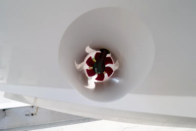  Yacht Photos Pics Bow thruster of a 2007 Intrepid 350 WA boat, featuring red blades.