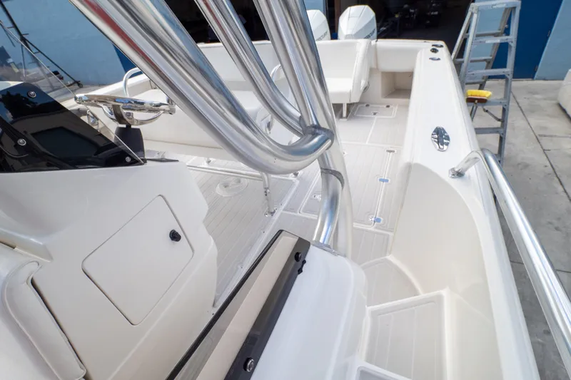  Yacht Photos Pics 2007 Intrepid 350 WA boat interior with stainless steel railings and helm station.