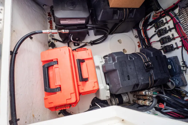  Yacht Photos Pics 2007 Intrepid 350 WA boat engine compartment with orange toolboxes and wiring.