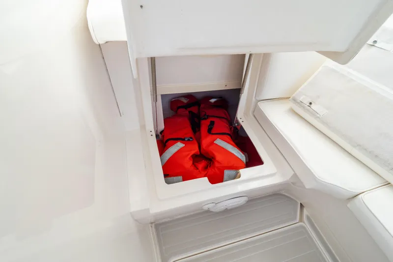  Yacht Photos Pics Storage compartment with life jackets on a 2007 Intrepid 350 WA boat.