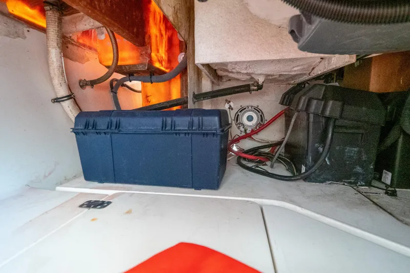  Yacht Photos Pics 2007 Intrepid 350 WA boat interior showing storage compartment and wiring.