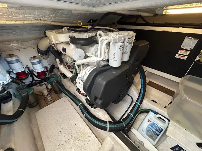 Limbo Yacht Photos Pics Engine room of 2010 Sabre 40 Sedan with visible components and hoses.