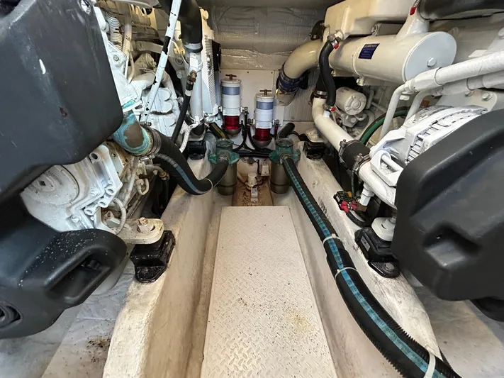 Limbo Yacht Photos Pics Engine room of a 2010 Sabre 40 Sedan boat, showcasing mechanical components.