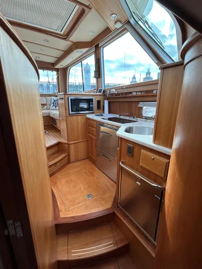 Limbo Yacht Photos Pics Luxurious 2010 Sabre 40 Sedan yacht interior with modern kitchen amenities.