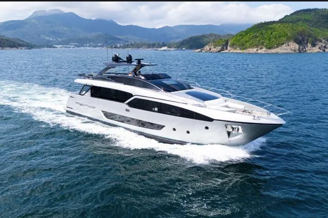  Yacht Photos Pics Luxury 2020 Riva 90 Argo yacht cruising in scenic coastal waters.