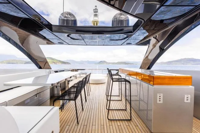  Yacht Photos Pics Luxurious 2020 Riva 90 Argo yacht deck with modern seating and ocean view.