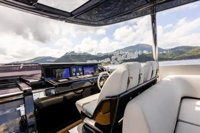  Yacht Photos Pics Luxurious 2020 Riva 90 Argo yacht interior with scenic coastal view.