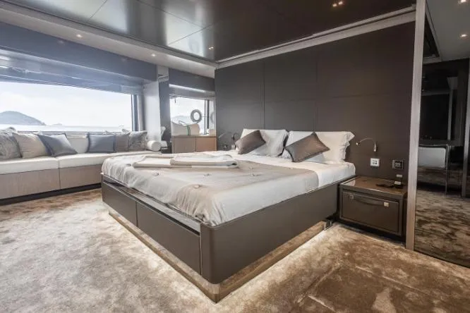  Yacht Photos Pics Luxurious bedroom interior on 2020 Riva 90 Argo yacht with modern design and large windows.
