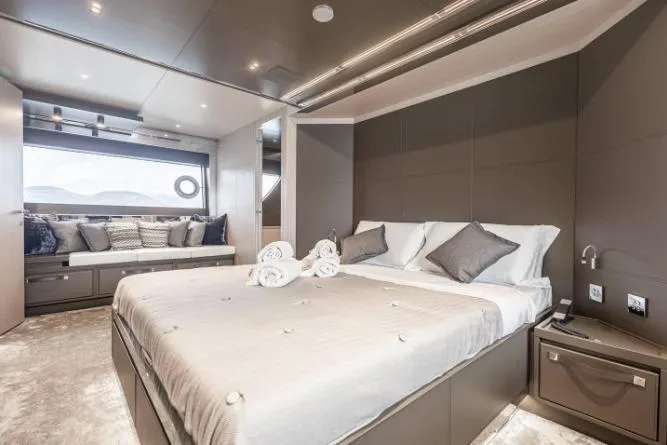  Yacht Photos Pics Luxurious bedroom interior of 2020 Riva 90 Argo yacht with modern design and elegant decor.
