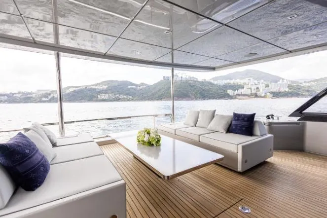  Yacht Photos Pics Luxurious 2020 Riva 90 Argo yacht interior with elegant seating and scenic ocean view.