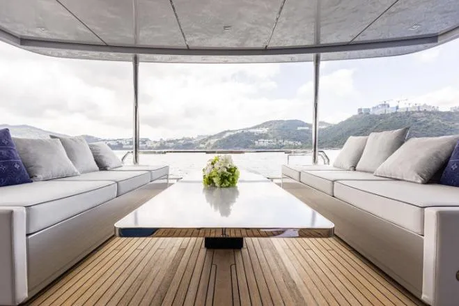  Yacht Photos Pics Luxurious 2020 Riva 90 Argo yacht interior with elegant seating and scenic ocean view.