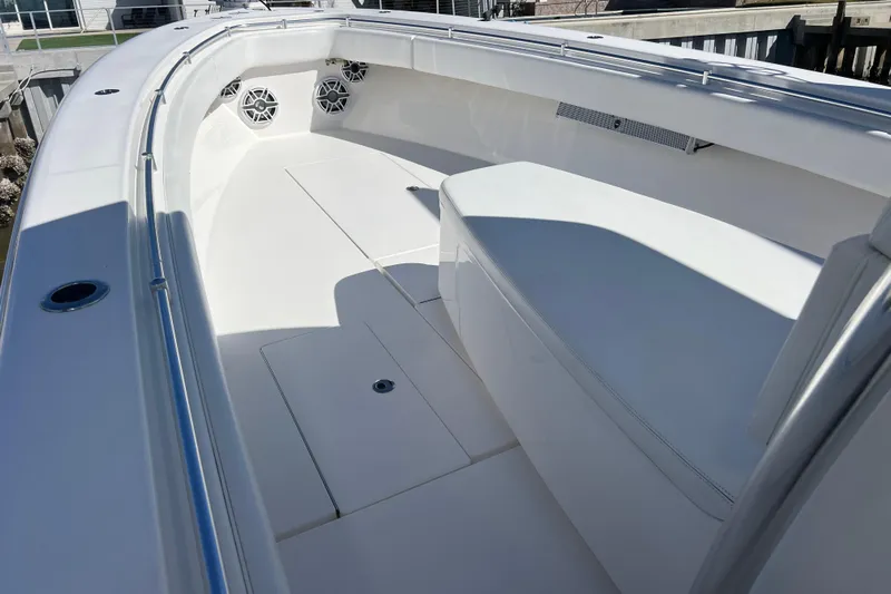  Yacht Photos Pics 2023 Contender 39 ST boat interior with white seating and speakers.