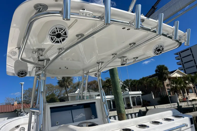 Yacht Photos Pics 2023 Contender 39 ST boat with sleek T-top and integrated speakers.