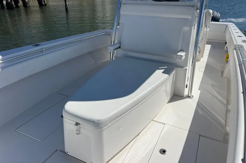  Yacht Photos Pics 2023 Contender 39 ST boat interior with white seating and sleek design.
