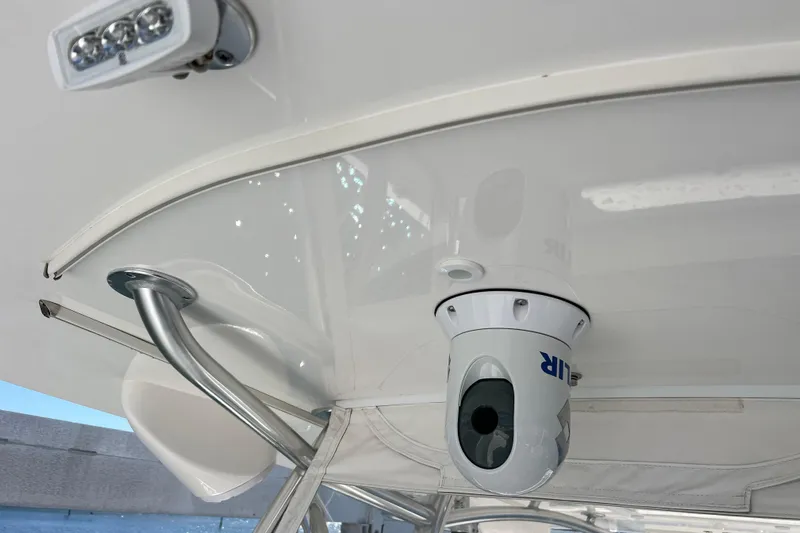  Yacht Photos Pics 2023 Contender 39 ST boat with mounted FLIR camera and LED light on the ceiling.