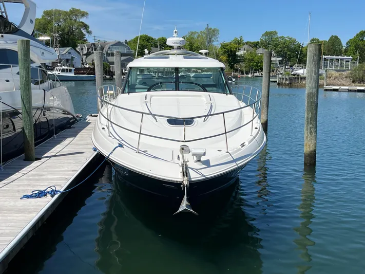 Feeling Nauti Yacht Photos Pics 2011 Sea Ray 470 Sundancer yacht docked in a marina.