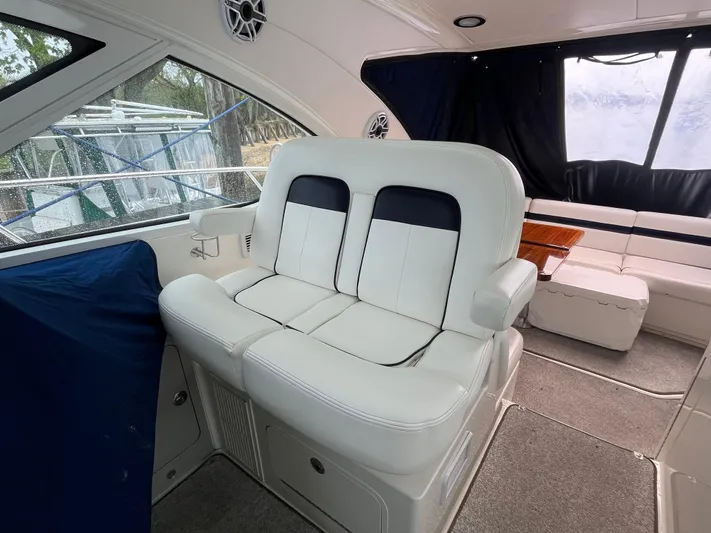 Feeling Nauti Yacht Photos Pics 2011 Sea Ray 470 Sundancer interior with white leather seating and modern design.