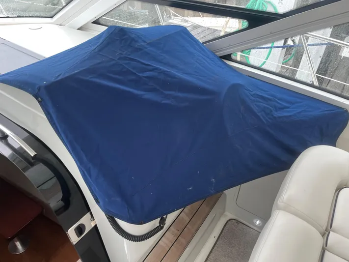 Feeling Nauti Yacht Photos Pics Blue cover on 2011 Sea Ray 470 Sundancer boat interior.