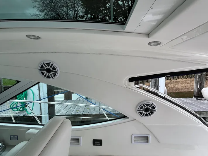 Feeling Nauti Yacht Photos Pics Interior view of 2011 Sea Ray 470 Sundancer yacht with sleek design and speakers.