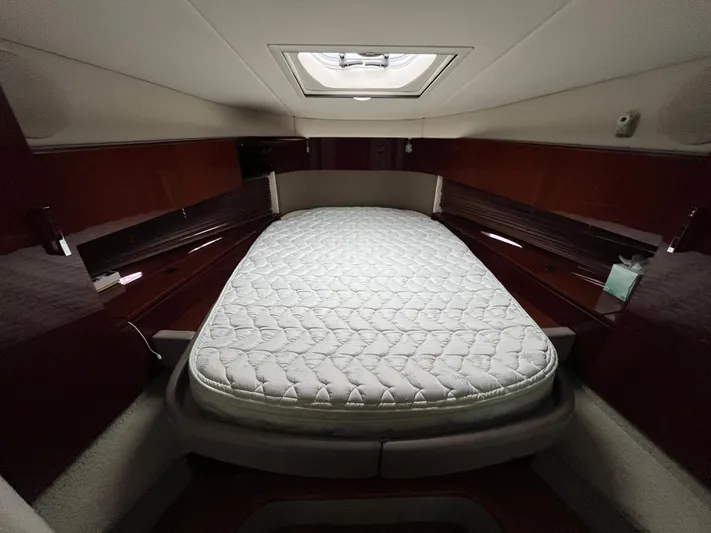 Feeling Nauti Yacht Photos Pics Luxurious cabin interior of 2011 Sea Ray 470 Sundancer yacht with a comfortable bed.