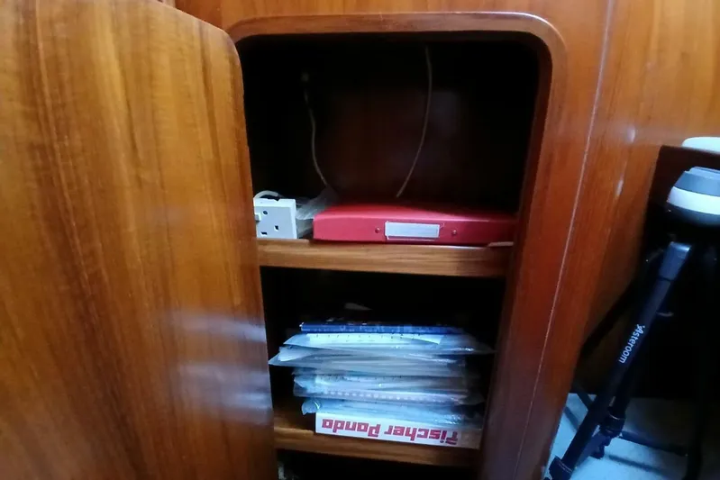 Waterfall II Yacht Photos Pics Wooden cabinet interior on a 1994 Beneteau Oceanis 44 CC sailboat.