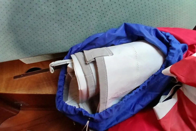 Waterfall II Yacht Photos Pics Rolled sail in blue bag on Beneteau Oceanis 44 CC, 1994 model.