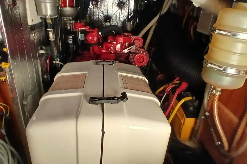 Waterfall II Yacht Photos Pics Engine room of 1994 Beneteau Oceanis 44 CC sailboat, featuring mechanical components.