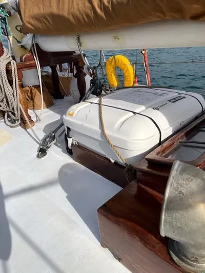 Interlude X Yacht Photos Pics Deck of 1985 Custom Thomas Colvin "Pipistrelle" sailboat with life raft and ropes.