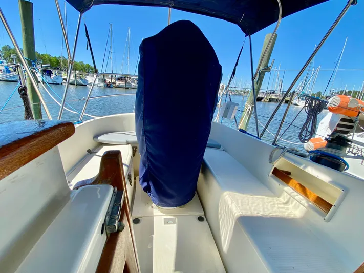 Encore Yacht Photos Pics Cockpit of 1998 Pacific Seacraft 37 sailboat, marina view, sunny day.