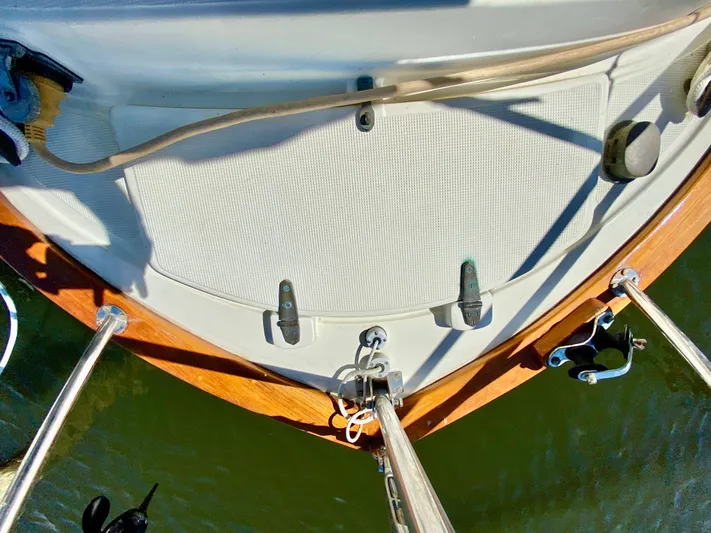 Encore Yacht Photos Pics Deck view of a 1998 Pacific Seacraft 37 sailboat, featuring wooden trim and rigging.