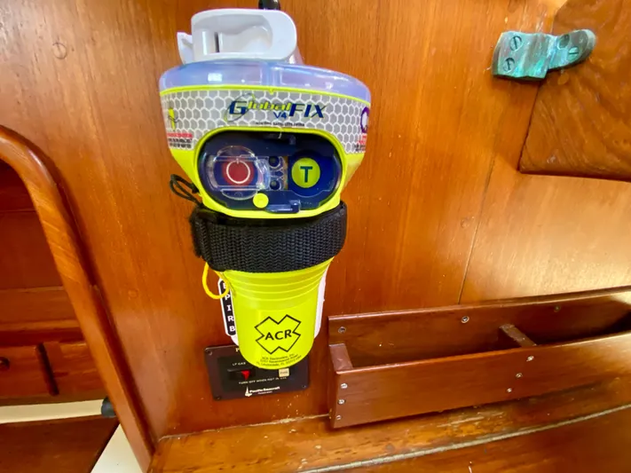 Encore Yacht Photos Pics Emergency beacon mounted on a 1998 Pacific Seacraft 37 sailboat interior.