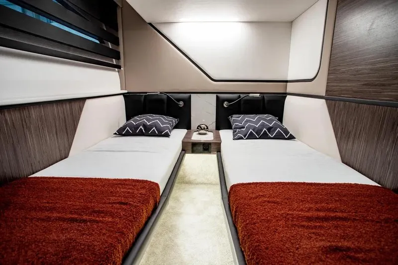  Yacht Photos Pics Luxurious twin cabin interior of 2025 Cobrey 45 FLY yacht with modern design.
