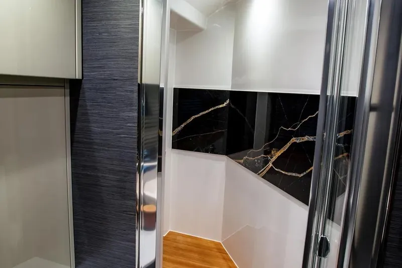  Yacht Photos Pics Luxurious interior of 2025 Cobrey 45 FLY yacht with modern design and elegant finishes.