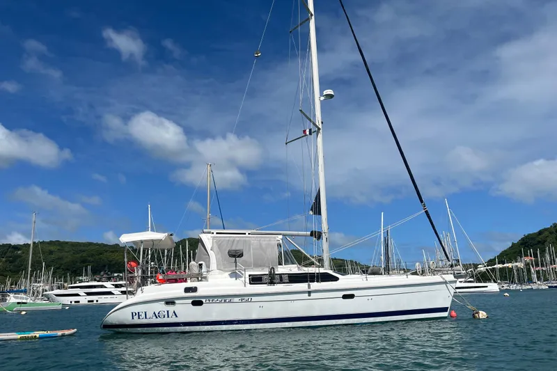 Pelagia Yacht Photos Pics Sailboat "Pelagia" Hunter Passage 450, 1998 model, anchored in a scenic marina.