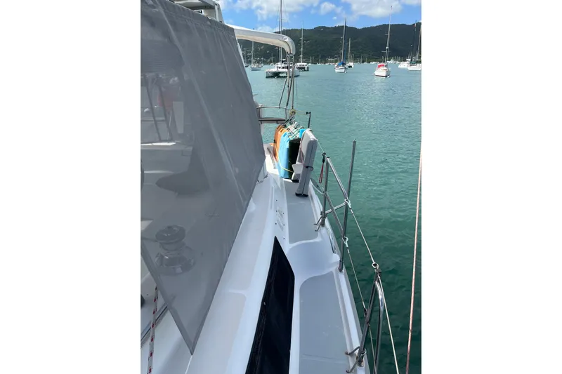 Pelagia Yacht Photos Pics Sailboat deck view of 1998 Hunter Passage 450 in a serene marina setting.