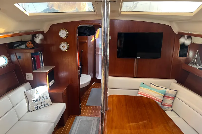 Pelagia Yacht Photos Pics Interior of 1998 Hunter Passage 450 yacht with cozy seating and modern amenities.