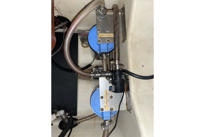 Pelagia Yacht Photos Pics Water filtration system in a 1998 Hunter Passage 450 yacht engine compartment.