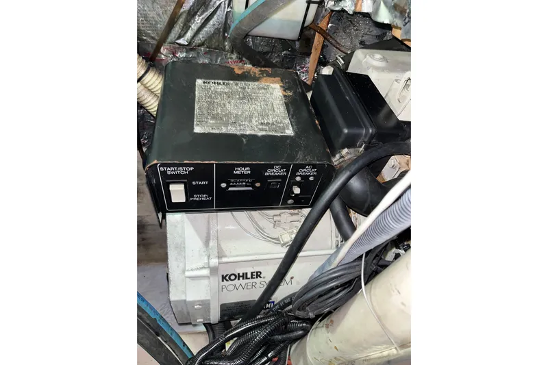 Pelagia Yacht Photos Pics Control panel of a Kohler generator in a 1998 Hunter Passage 450 yacht.