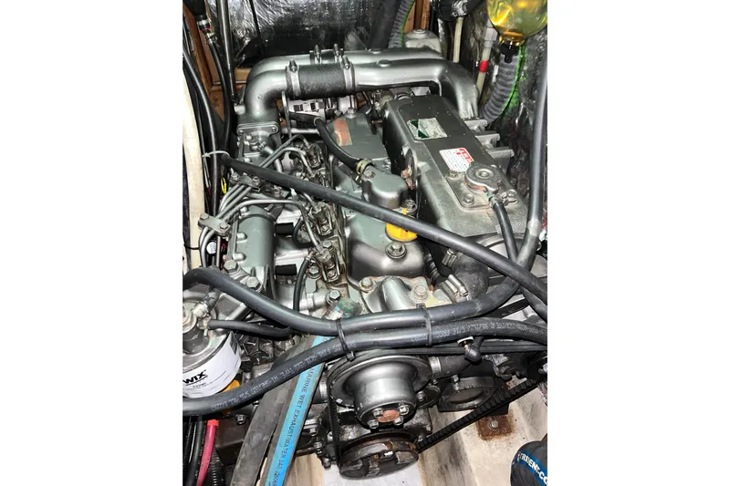 Pelagia Yacht Photos Pics Engine of 1998 Hunter Passage 450 sailboat, showcasing intricate mechanical components.