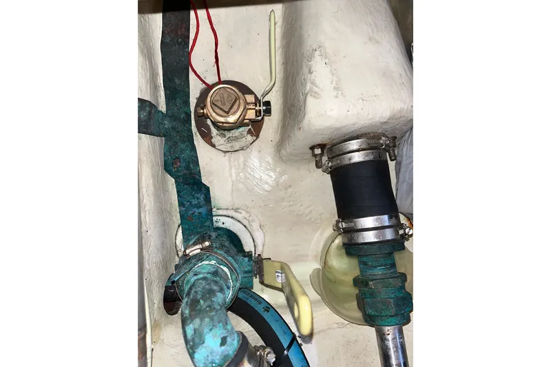 Pelagia Yacht Photos Pics 1998 Hunter Passage 450 boat plumbing system with pipes and fittings.