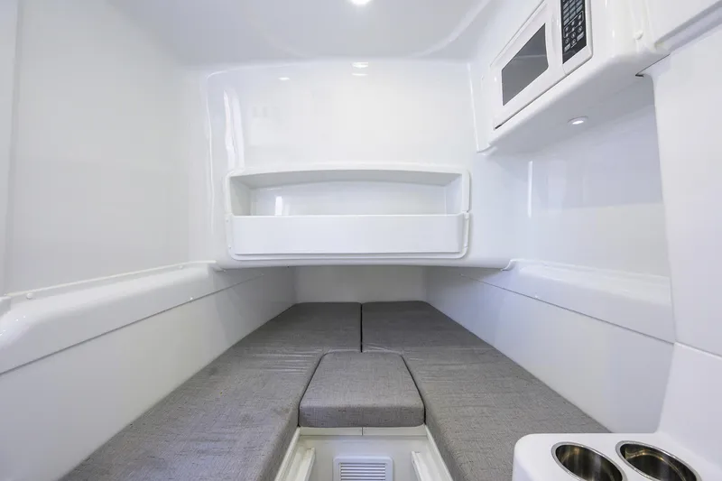 Denied Yacht Photos Pics Interior cabin of 2021 Yellowfin 42 boat with modern amenities and seating.