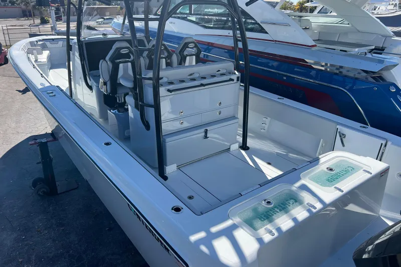  Yacht Photos Pics 2026 Contender 39 ST boat interior with seating and storage compartments.