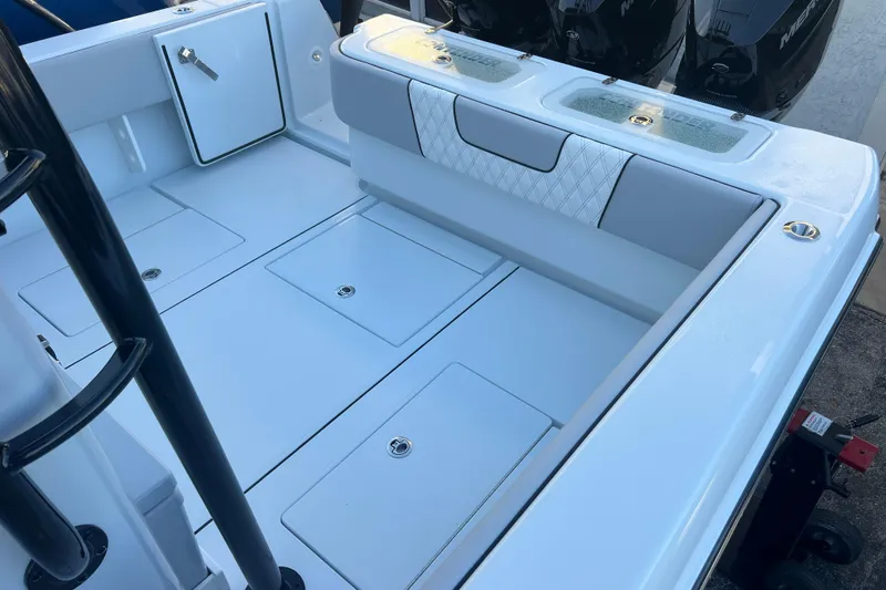  Yacht Photos Pics 2026 Contender 39 ST boat interior with storage compartments and seating.