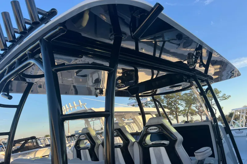 Yacht Photos Pics 2026 Contender 39 ST boat interior with sleek black framework and modern seating.