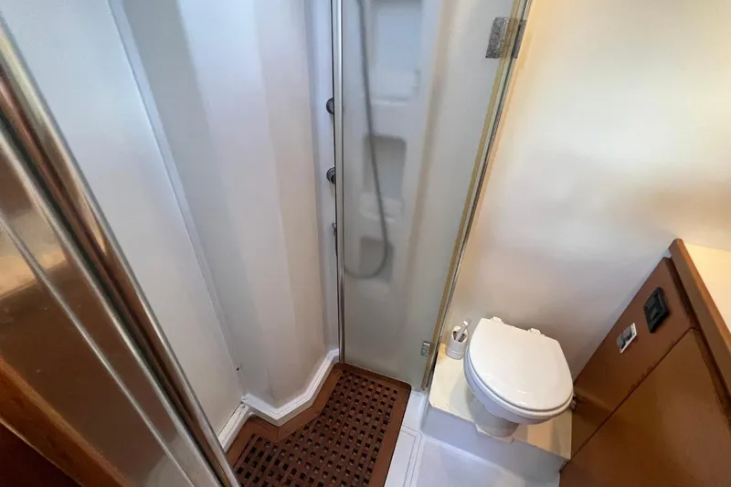 Ibubi Yacht Photos Pics Compact bathroom in 2010 Grand Soleil 54 yacht with shower and toilet.