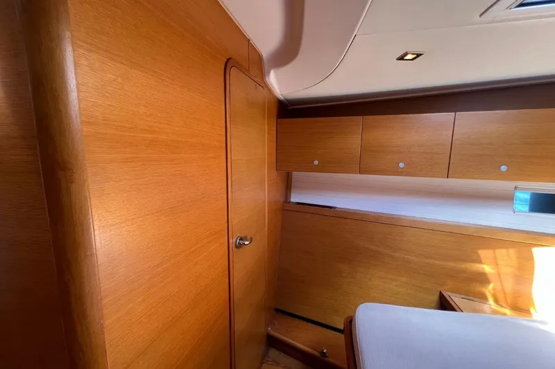 Ibubi Yacht Photos Pics Interior of 2010 Grand Soleil 54 yacht with wooden cabinetry and modern design.