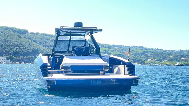  Yacht Photos Pics 2022 Evo Yachts R4 WA on serene water with scenic hillside backdrop.