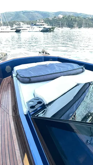  Yacht Photos Pics Evo Yachts R4 WA 2022 on serene water with scenic mountain backdrop.