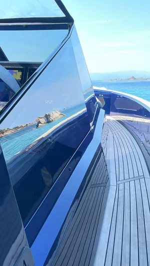  Yacht Photos Pics 2022 Evo Yachts R4 WA with sleek design, reflecting ocean view.