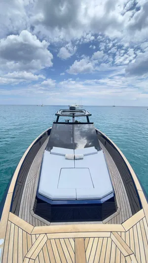  Yacht Photos Pics 2022 Evo Yachts R4 WA on serene ocean with cloudy sky backdrop.